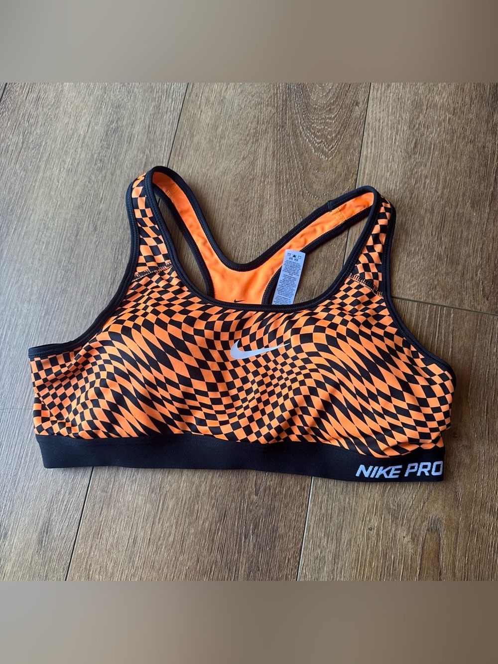 Nike Orange and Black Wavy Checker Sports Bra. Size L
